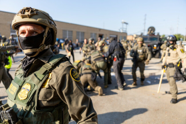 chicago-illinois-usa-3rd-oct-2025-a-us-border-patrol-agent-keeps-press-away-from-a-person-being-arrested-by-federal-agents-during-a-demonstration-in-suburban-chicago-the-peaceful-demonstration