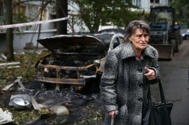 an-elderly-woman-reacts-next-to-the-house-destroyed-by-a-russian-strike-in-zaporizhzhia-ukraine-sunday-oct-5-2025-ap-photokateryna-klochko