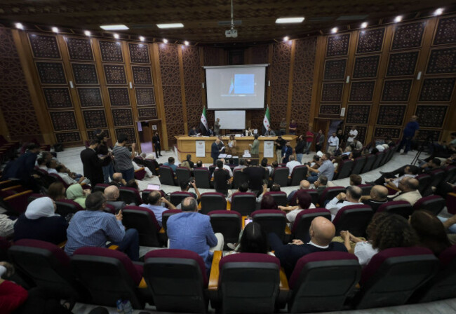 syrian-electoral-college-members-and-candidates-attend-the-ballots-count-shortly-after-polling-stations-closed-at-latakias-governor-building-in-the-coastal-city-of-latakia-syria-sunday-oct-5-2