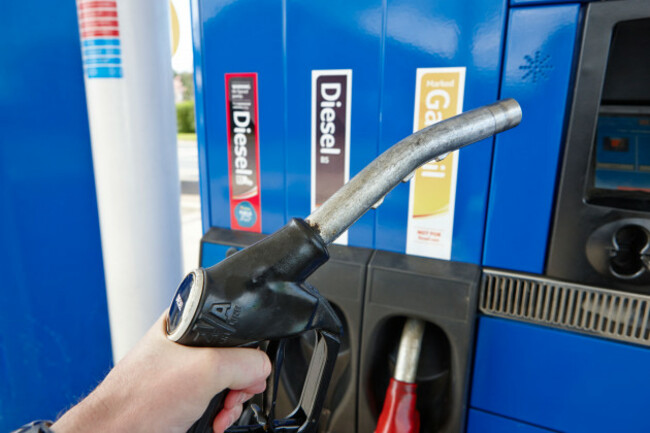 man-holding-refueling-nozzle-at-gas-oil-diesel-and-high-speed-biofuel-diesel-pumps-at-a-petrol-station-northern-ireland