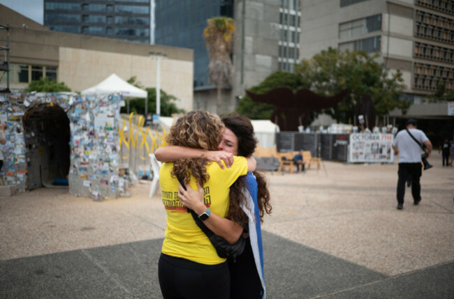 tel-aviv-israel-09th-oct-2025-two-israelis-embrace-as-people-gather-at-hostage-square-in-tel-aviv-to-celebrate-the-ceasefire-deal-after-2-years-of-war-israel-and-hamas-have-agreed-on-the-first