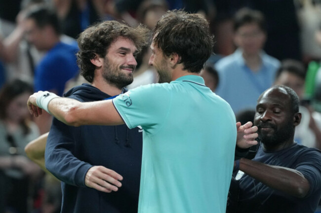arthur-rinderknech-of-france-right-is-greeted-by-his-cousin-valentin-vacherot-of-monaco-after-defeating-daniil-medvedev-of-russia-in-the-mens-singles-semifinal-match-of-the-shanghai-masters-tennis