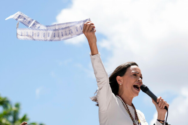 opposition-leader-maria-corina-machado-holds-up-vote-tally-sheets-during-a-protest-against-the-reelection-of-president-nicolas-maduro-one-month-after-the-disputed-presidential-vote-which-she-says-the
