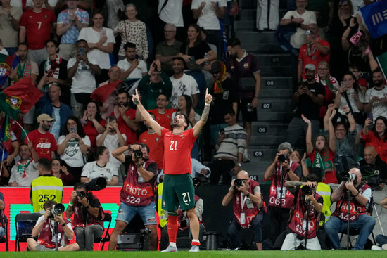 ruben-neves-of-portugal-celebrates-after-scoring-the-opening-goal-against-ireland-during-a-world-cup-2026-group-f-qualifying-soccer-match-between-portugal-and-ireland-in-lisbon-saturday-oct-11-202