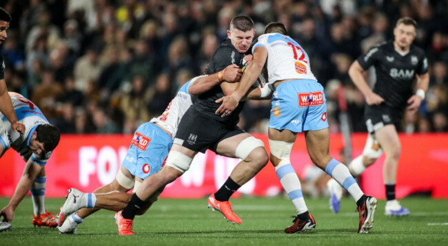 nick-timoney-is-tackled-by-harold-vorster-and-jeandre-rudolph