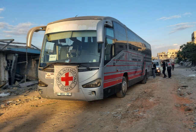 red-cross-vehicles-and-buses-stand-by-in-khan-younis-southern-gaza-strip-on-monday-oct-13-2025-ahead-of-the-release-of-palestinian-prisoners-by-israel-ap-photomohammad-jahjouh