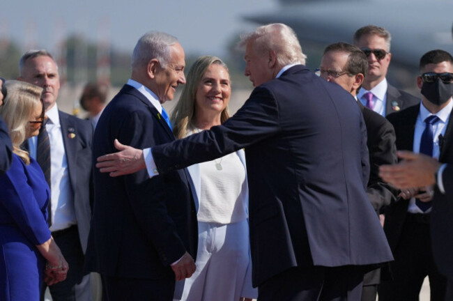 president-donald-trump-greets-israels-prime-minister-benjamin-netanyahu-as-he-arrives-at-ben-gurion-international-airport-monday-oct-13-2025-near-tel-aviv-ap-photoevan-vucci