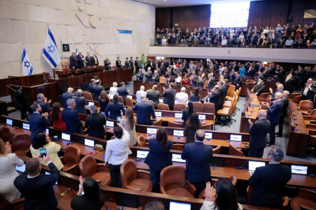 president-donald-trump-receives-a-standing-ovation-before-speaking-at-the-knesset-israels-parliament-monday-oct-13-2025-in-jerusalem-chip-somodevillapool-via-ap