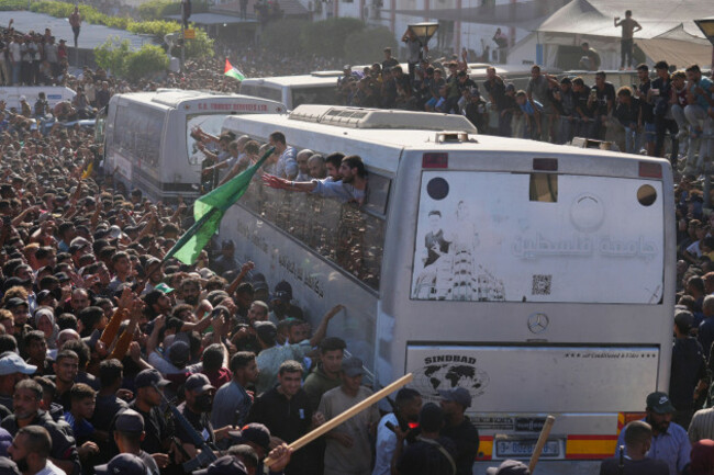 people-gather-to-greet-freed-palestinian-prisoners-arriving-on-buses-in-the-gaza-strip-after-their-release-from-israeli-jails-under-a-ceasefire-agreement-between-hamas-and-israel-outside-nasser-hospi