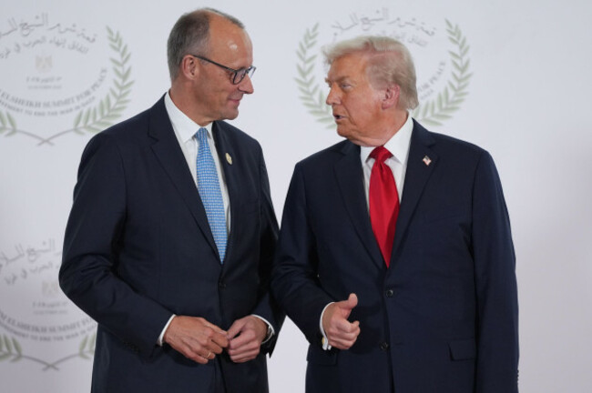 president-donald-trump-greets-germanys-chancellor-friedrich-merz-during-summit-to-support-ending-the-more-than-two-year-israel-hamas-war-in-gaza-after-a-breakthrough-ceasefire-deal-monday-oct-13