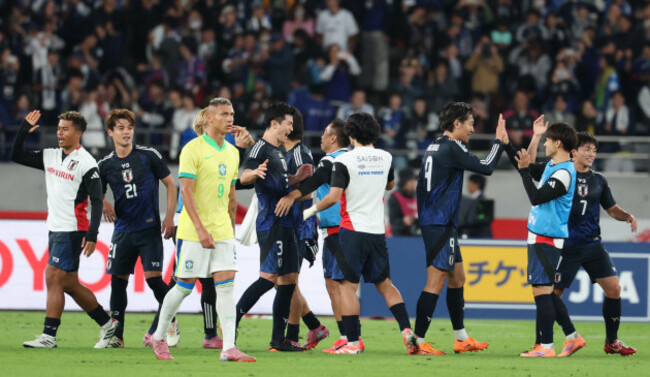 members-of-japan-celebrate-after-winning-a-friendly-match-against-brazil-at-tokyo-stadium-in-tokyo-on-october-14-2025-japan-national-football-team-won-the-match-by-3-2-the-yomiuri-shimbun-via-ap