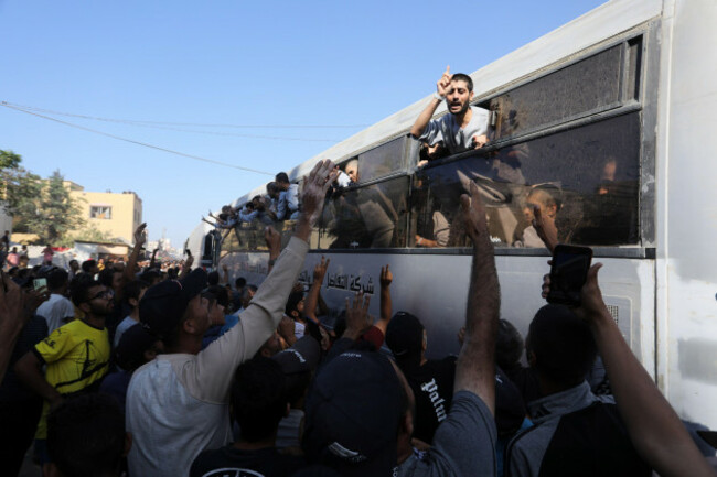 khan-yunis-gaza-14th-oct-2025-people-gather-to-welcome-palestinians-released-from-israeli-prisons-under-a-gaza-ceasefire-and-hostage-exchange-deal-with-palestinian-factions-as-the-buses-carrying