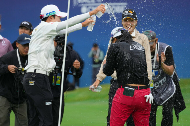 sei-young-kim-of-south-korea-right-celebrates-after-winning-the-lpga-ladies-championship-golf-tournament-at-the-pine-beach-golf-links-in-haenam-south-korea-sunday-oct-19-2025-ap-photolee-ji