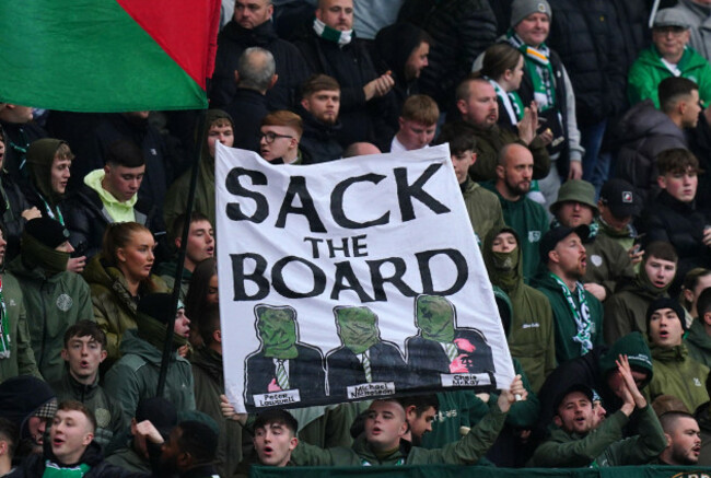 celtic-fans-in-the-stands-hold-up-a-sack-the-board-banner-ahead-of-the-william-hill-premiership-match-at-dens-park-dundee-picture-date-sunday-october-19-2025