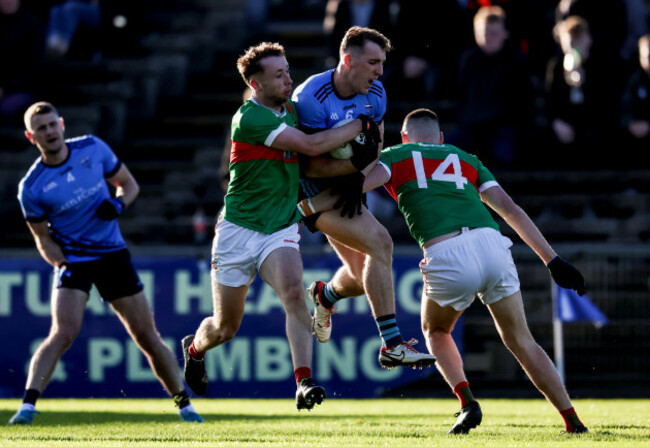 eoghan-mclaughlin-comes-up-against-david-tighe-and-jack-irwin