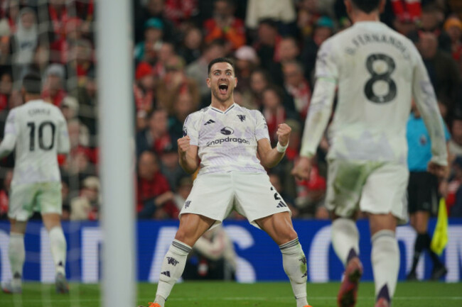 manchester-uniteds-diogo-dalot-celebrates-after-manchester-uniteds-harry-maguire-scored-during-the-english-premier-league-soccer-match-between-liverpool-and-manchester-united-in-liverpool-england