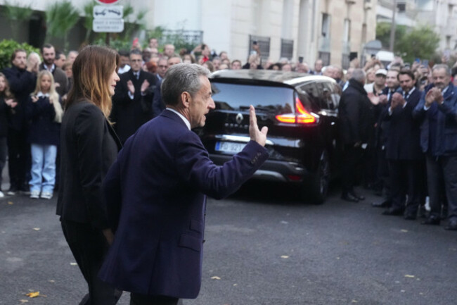 former-french-president-nicolas-sarkozy-was-to-supporters-as-he-and-his-wife-carla-bruni-sarkozy-leave-their-home-tuesday-oct-21-2025-in-paris-as-nicolas-sarkozy-heads-to-prison-to-serve-time-for-a