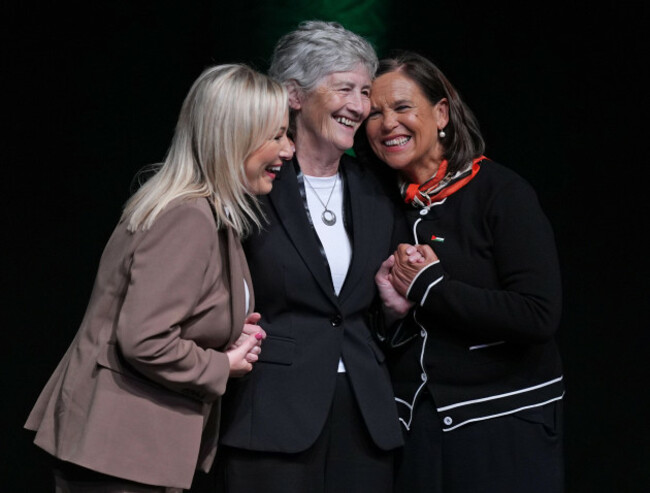 sinn-fein-deputy-leader-michelle-oneill-left-and-leader-mary-lou-mcdonald-right-hug-presidential-candidate-catherine-connolly-at-the-partys-building-for-unity-national-conference-at-the-helix-in
