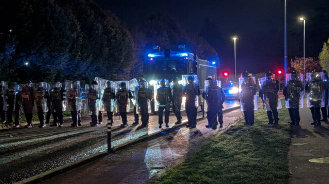 retransmitting-amending-location-gardai-officers-block-protesters-in-saggart-as-disturbances-have-flared-outside-citywest-hotel-which-used-to-house-asylum-seekers-picture-date-tuesday-october-21-2