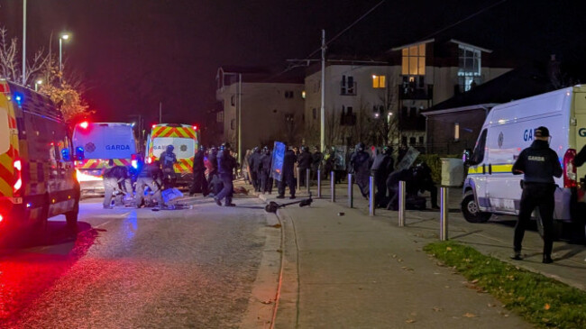 gardai-officers-detain-protesters-near-the-citywest-hotel-as-disturbances-have-flared-outside-the-dublin-hotel-which-used-to-house-asylum-seekers-picture-date-wednesday-october-22-2025