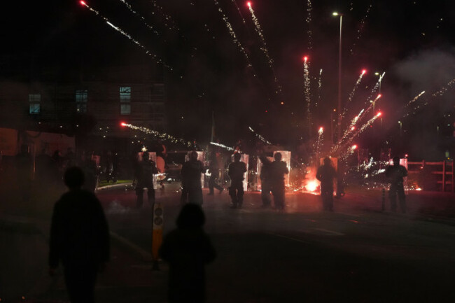 protesters-throw-fireworks-at-gardai-officers-near-the-citywest-hotel-as-disturbances-have-flared-outside-the-dublin-hotel-which-used-to-house-asylum-seekers-picture-date-wednesday-october-22-2025