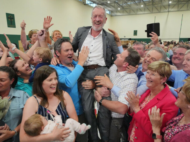 sean-kelly-celebrates-with-friends-family-and-supporters-after-becoming-the-first-mep-to-be-elected-in-irelands-european-elections-at-nemo-rangers-gaa-club-in-cork-ireland-during-the-count-for-th