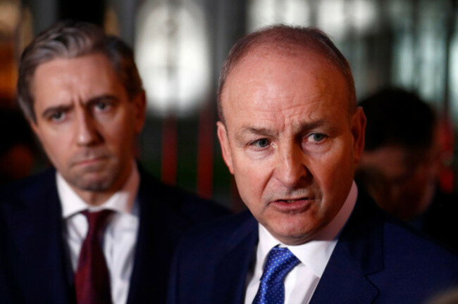 fianna-fail-leader-micheal-martin-right-and-fine-gaels-simon-harris-talk-to-the-media-outside-the-government-building-in-dublin-wednesday-jan-22-2025-ap-photopeter-morrison