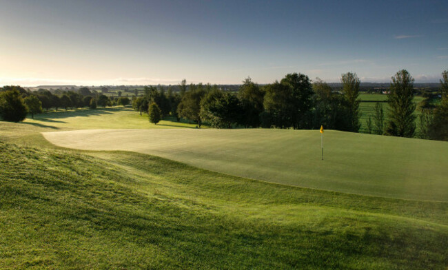 Esker Hills 17 green to tee sunrise 1 9600