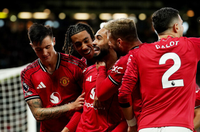 manchester-uniteds-matheus-cunha-centre-celebrates-with-team-mates-after-scoring-their-sides-first-goal-during-the-premier-league-match-at-old-trafford-manchester-picture-date-saturday-october