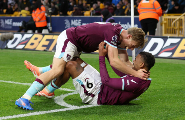 burnleys-lyle-foster-right-celebrates-with-team-mate-zian-flemming-after-scoring-their-sides-third-goal-of-the-game-during-the-premier-league-match-at-molineux-stadium-wolverhampton-picture-date