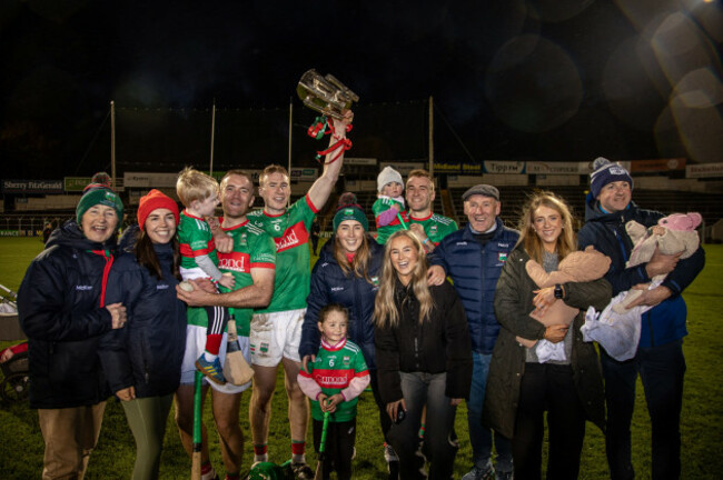 the-mcgrath-family-celebrate-after-the-match-with-the-trophy