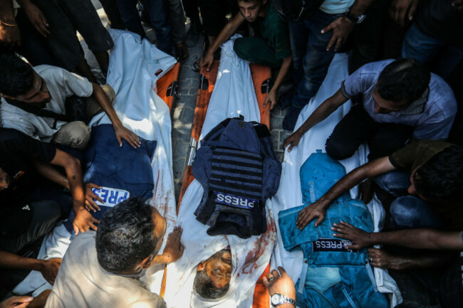 palestinians-mourners-attend-the-funeral-of-reuters-photojournalist-hossam-al-masry-al-jazeera-cameraman-mohamed-salama-journalist-mariam-abu-daqqa-who-worked-with-several-media-outlets-including