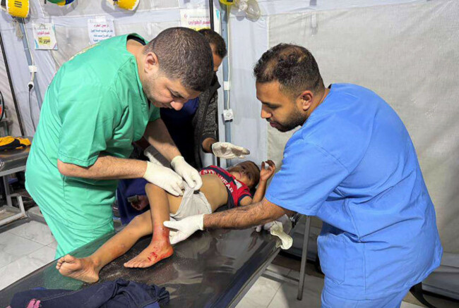 medics-at-the-kuwaiti-field-hospital-rushed-to-evacuate-and-treat-a-number-of-wounded-individuals-including-children-after-israeli-airstrikes-targeted-an-area-sheltering-displaced-families-in-khan-y