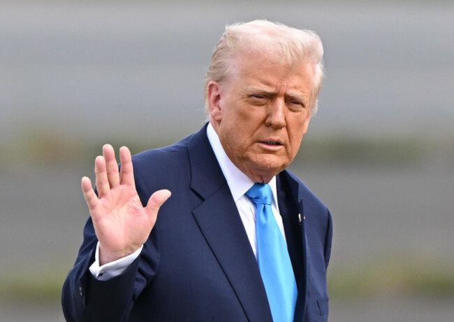 u-s-president-donald-trump-waves-his-hand-as-he-heads-to-air-force-one-at-the-tokyo-international-airport-in-tokyo-japan-on-october-29-2025-he-departs-for-south-korea-the-yomiuri-shimbun-via-a