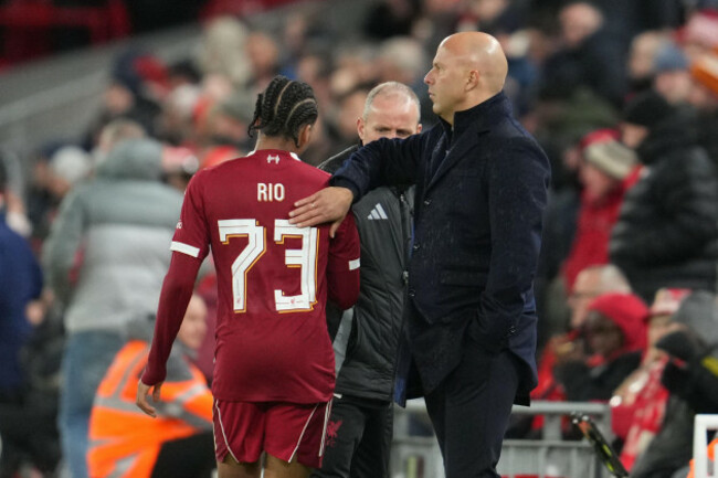 liverpools-manager-arne-slot-pats-liverpools-liverpools-rio-ngumoha-as-he-is-substituted-during-the-english-league-cup-fourth-round-soccer-match-between-liverpool-and-crystal-palace-in-liverpool-e