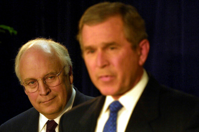 washington-dc-vice-president-elect-dick-cheney-eyes-his-boss-at-a-press-conference-at-the-transition-office