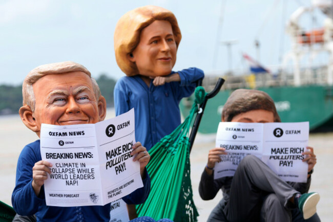 oxfam-activists-wear-puppet-heads-in-the-likeness-of-u-s-president-donald-trump-left-president-of-the-european-commission-ursula-von-der-leyen-center-and-president-of-argentina-javier-milei-as-th
