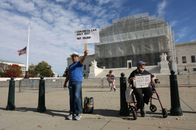 demonstrators-outside-the-us-supreme-court-in-washington-where-the-justices-were-hearing-arguments-on-president-trumps-tariffs-nov-5-2025-francis-chungpolitico-via-ap-images