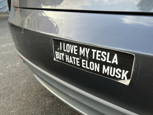 lafayette-united-states-28th-mar-2025-close-up-of-a-tesla-bumper-featuring-a-sticker-that-reads-i-love-my-tesla-but-hate-elon-musk-lafayette-california-march-28-2025-photo-by-smith-collect