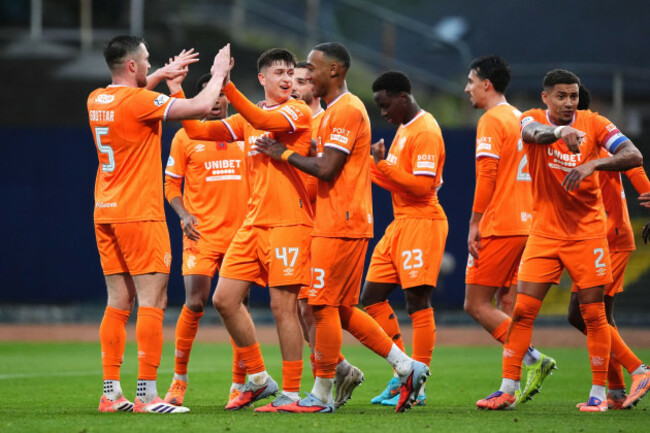 rangers-mikey-moore-third-left-celebrates-scoring-their-sides-third-goal-of-the-game-with-team-mates-during-the-william-hill-premiership-match-at-dens-park-dundee-picture-date-sunday-november-9