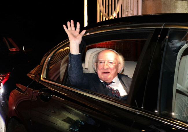 president-michael-d-higgins-waves-to-the-crowd-whilst-leaving-aras-an-uachtarain-with-his-wife-sabina-higgins-a-guard-of-honour-was-formed-outside-the-gates-of-the-official-residence-by-the-members