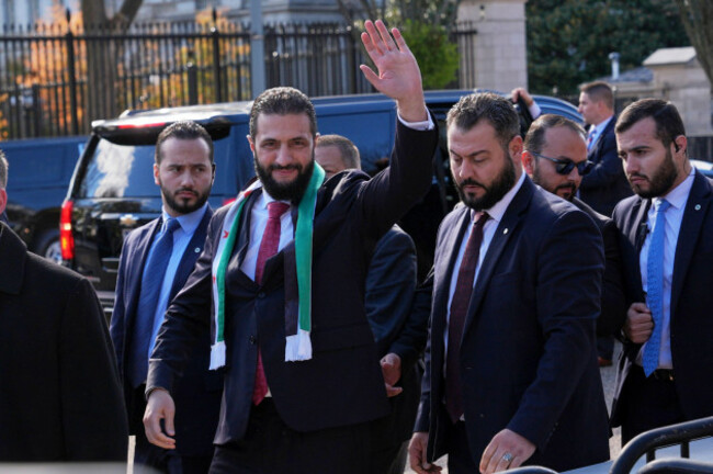 syrias-president-ahmed-al-sharaa-waves-as-he-greets-supporters-outside-of-the-white-house-monday-nov-10-2025-in-washington-following-a-meeting-with-president-donald-trump-ap-photojacquelyn-m