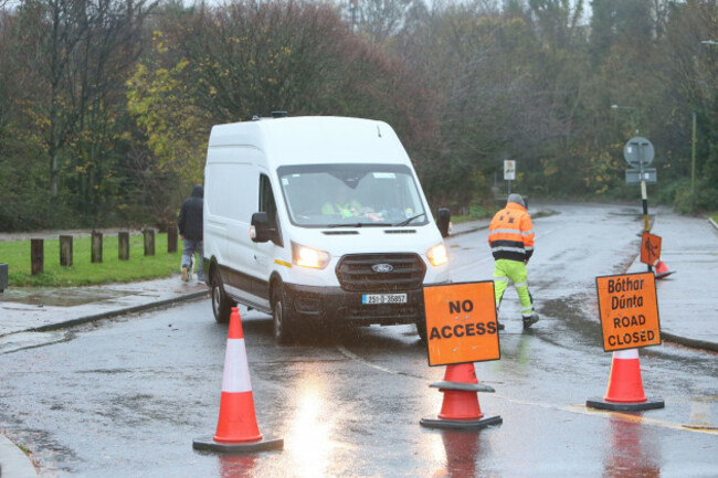 dublin-ireland-15th-november-2025-a-section-of-road-closed-on-a-street-beside-the-river-dodder-in-rathfarnham-as-storm-claudia-brings-an-orange-weather-warning-with-heavy-rainfall-and-wind-in-the