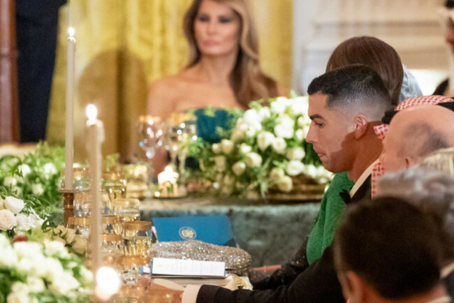 soccer-player-cristiano-ronaldo-right-listens-as-president-donald-trump-speaks-during-a-dinner-for-saudi-arabias-crown-prince-mohammed-bin-salman-in-the-east-room-of-the-white-house-tuesday-nov