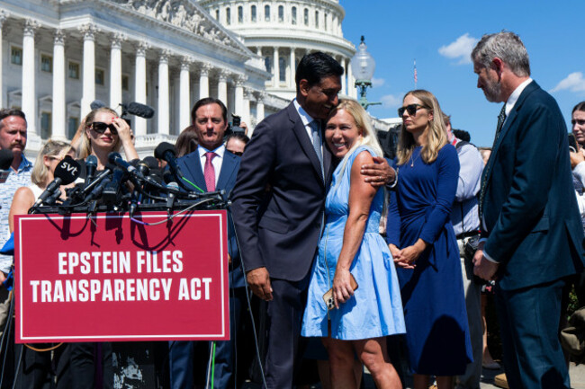 washington-united-states-03rd-sep-2025-united-states-september-3-from-left-rep-ro-khanna-d-calif-hugs-rep-marjorie-taylor-greene-r-ga-as-rep-thomas-massie-r-ky-looks-on-at-the-conc