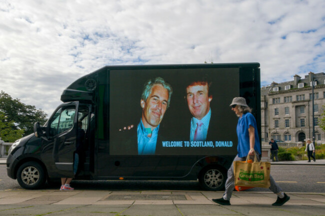 a-photograph-of-us-president-donald-trump-and-convicted-child-sex-offender-jeffrey-epstein-is-displayed-on-the-side-of-a-van-in-aberdeen-city-centre-during-us-president-donald-trumps-five-day-privat