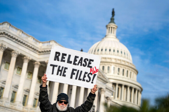 washington-united-states-18th-nov-2025-a-demonstrator-holds-a-poster-during-a-press-conference-with-survivors-of-convicted-sex-offender-jeffrey-epstein-on-the-epstein-files-transparency-act-outsid