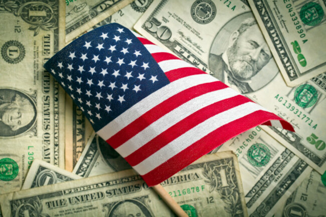 top-view-american-flag-on-us-dollars-background