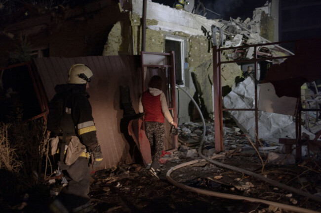 kharkiv-ukraine-24th-nov-2025-rescuers-work-at-the-site-of-a-russia-drone-strike-during-russias-attack-on-ukraine-in-kharkiv-ukraine-on-november-24-2025-photo-by-evhen-titovabacapress-com-cred