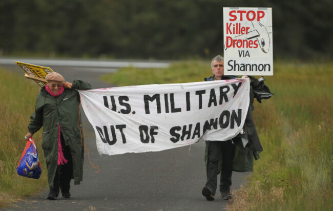 shannon-peace-activists-niall-farrell-and-margaretta-darcy-are-detained-by-police-as-they-attempt-to-block-the-runway-of-shannon-airport-in-protest-at-the-use-of-the-airport-by-the-cia-and-us-militar